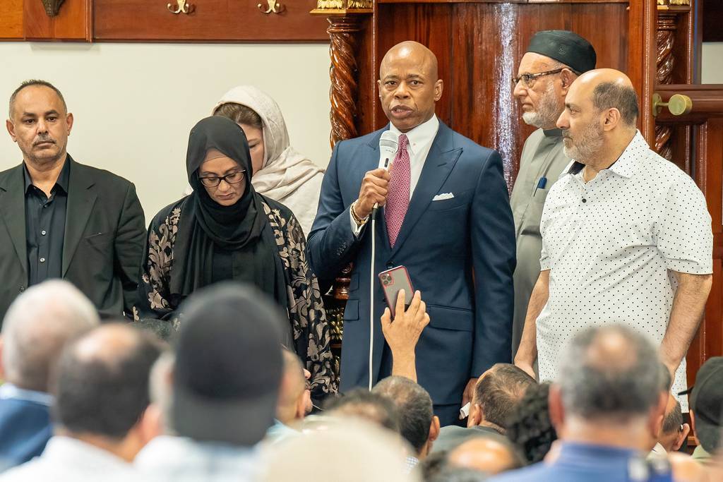 Mayor Eric Adams addresses family and friends of Hamoud Saeidi in the Beit El-Maqdis Islamic Center in Brooklyn on Monday. 