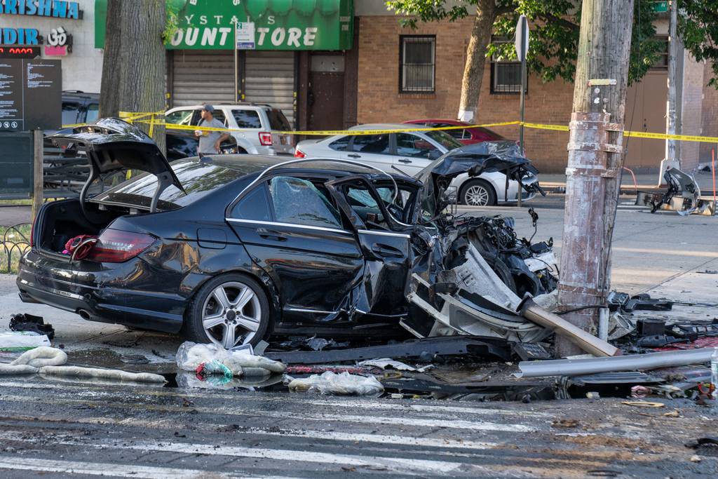 The front end of the Mercedes-Benz was severely damaged in the crash. The car’s driver stayed at the scene, said police. 