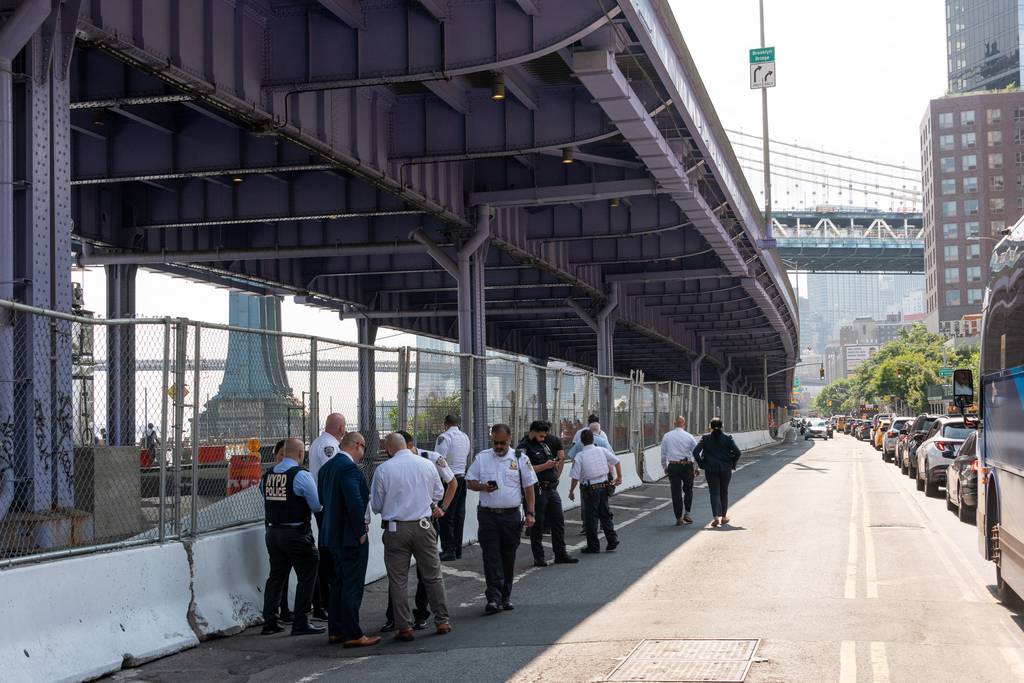 The stabber jumped roughly 50 feet from the FDR Drive overpass and broke both his legs, law enforcement sources said.