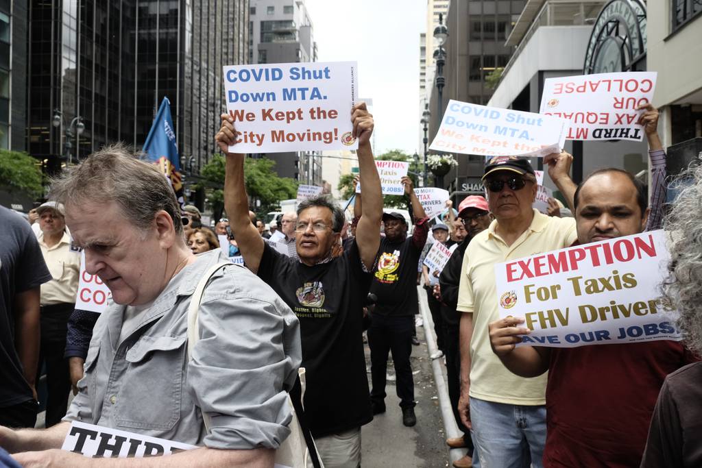 Taxi drivers rally outside Gov. Kathy Hochul's New York City office last month. 