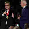 Elton John was moved to tears by a surprise award from President Biden 