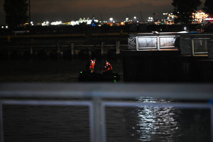 police searching water behind IKEA