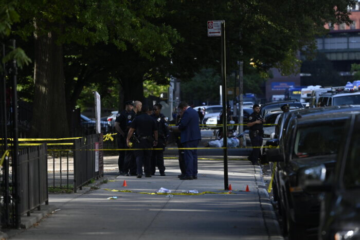 cops mark bullets on crime scene