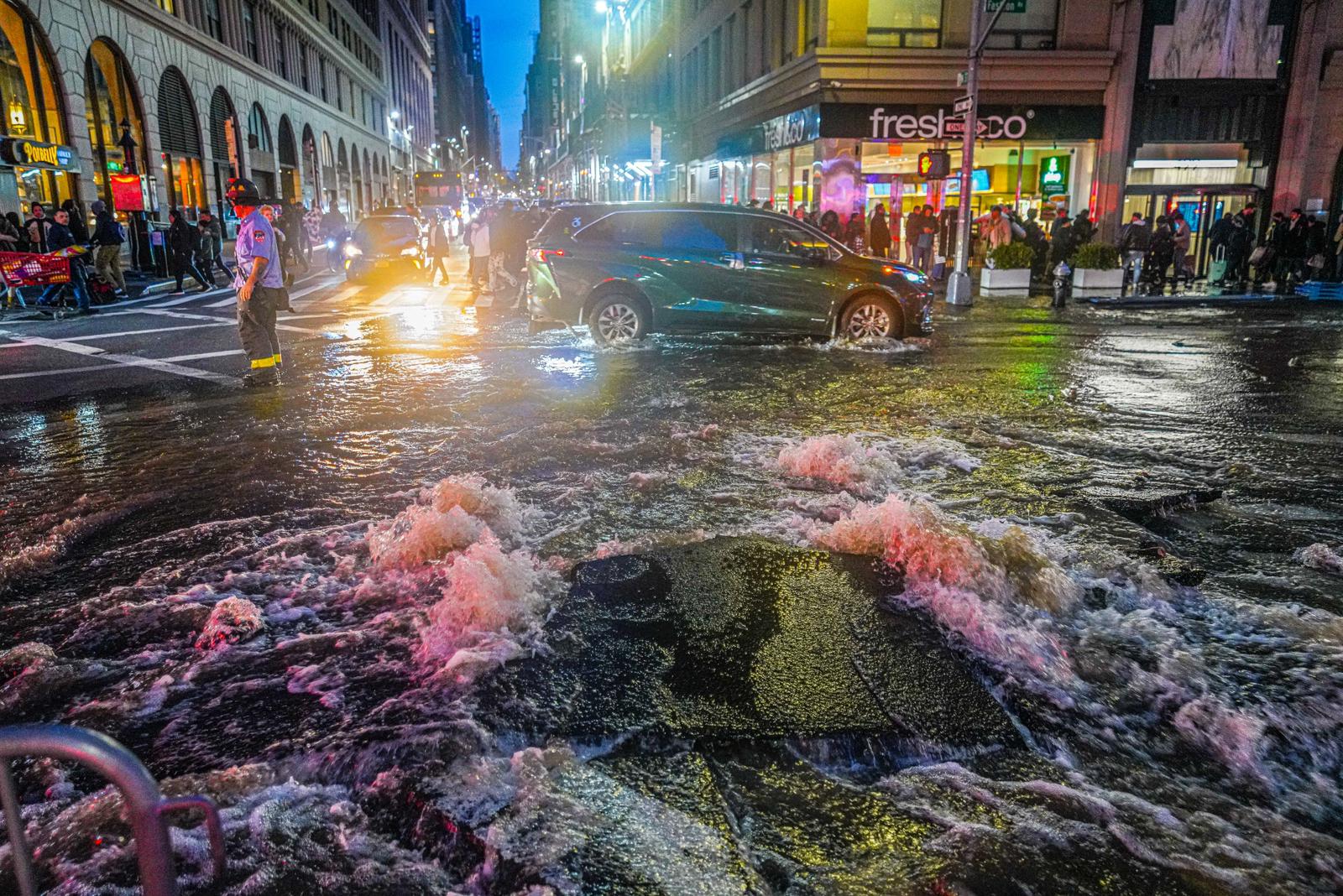 Major Midtown water main break cracks roadway, disrupts Black Friday shopping