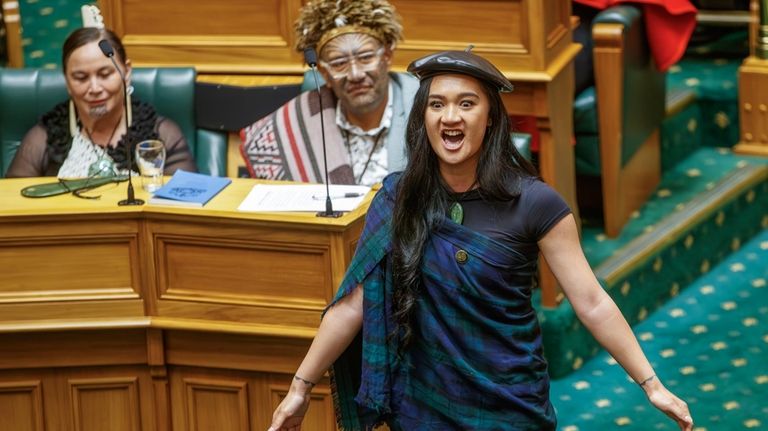 Te Pati Maori MP Hana-Rawhiti Maipi-Clarke reacts in the chamber...