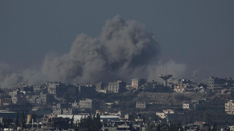 Some rises from the Gaza Strip after Israeli strikes Saturday,...