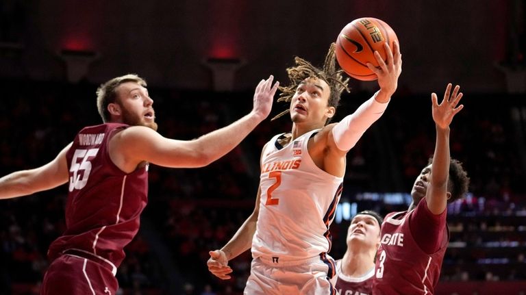 Illinois' Dra Gibbs-Lawhorn drives the the basket between Colgate's Jeff...