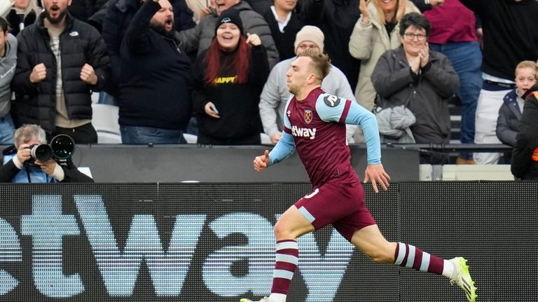 West Ham's Jarrod Bowen celebrates after scoring his side's opening...