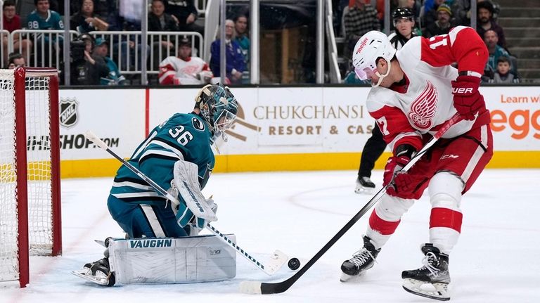 San Jose Sharks goaltender Kaapo Kahkonen (36) blocks a shot...