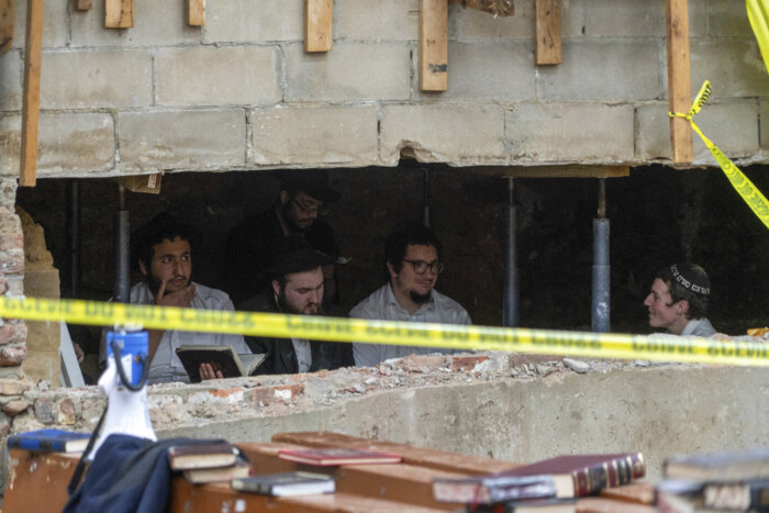 men inside chabad lubavitch tunnel