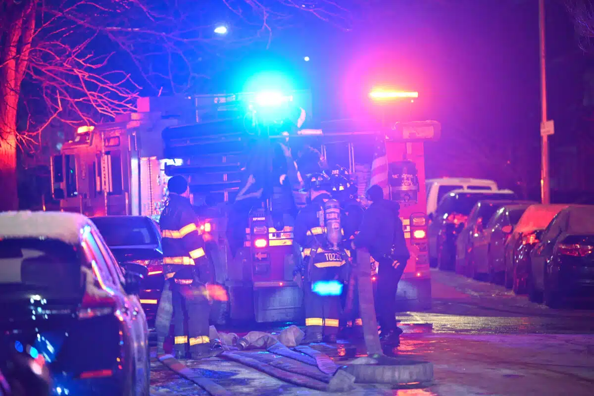 Firefighters dealt with frozen hydrants while battling a third floor apartment fire at 669 East 5th Street.