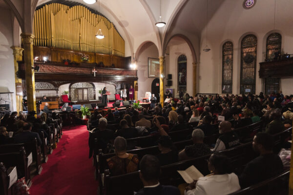 A congregation of support: The Antioch Baptist Church filled with attendees, gathered to witness the investiture of Judge Lola Waterman.