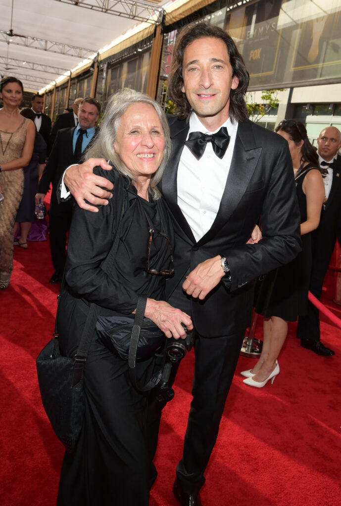 Sylvia Plachy, left, and her son, Adrien Brody arrive at the 67th Primetime Emmy Awards on Sunday, Sept. 20, 2015, at the Microsoft Theater in Los Angeles.<br>Photo: Charles Sykes/Invision for the Television Academy/AP Images