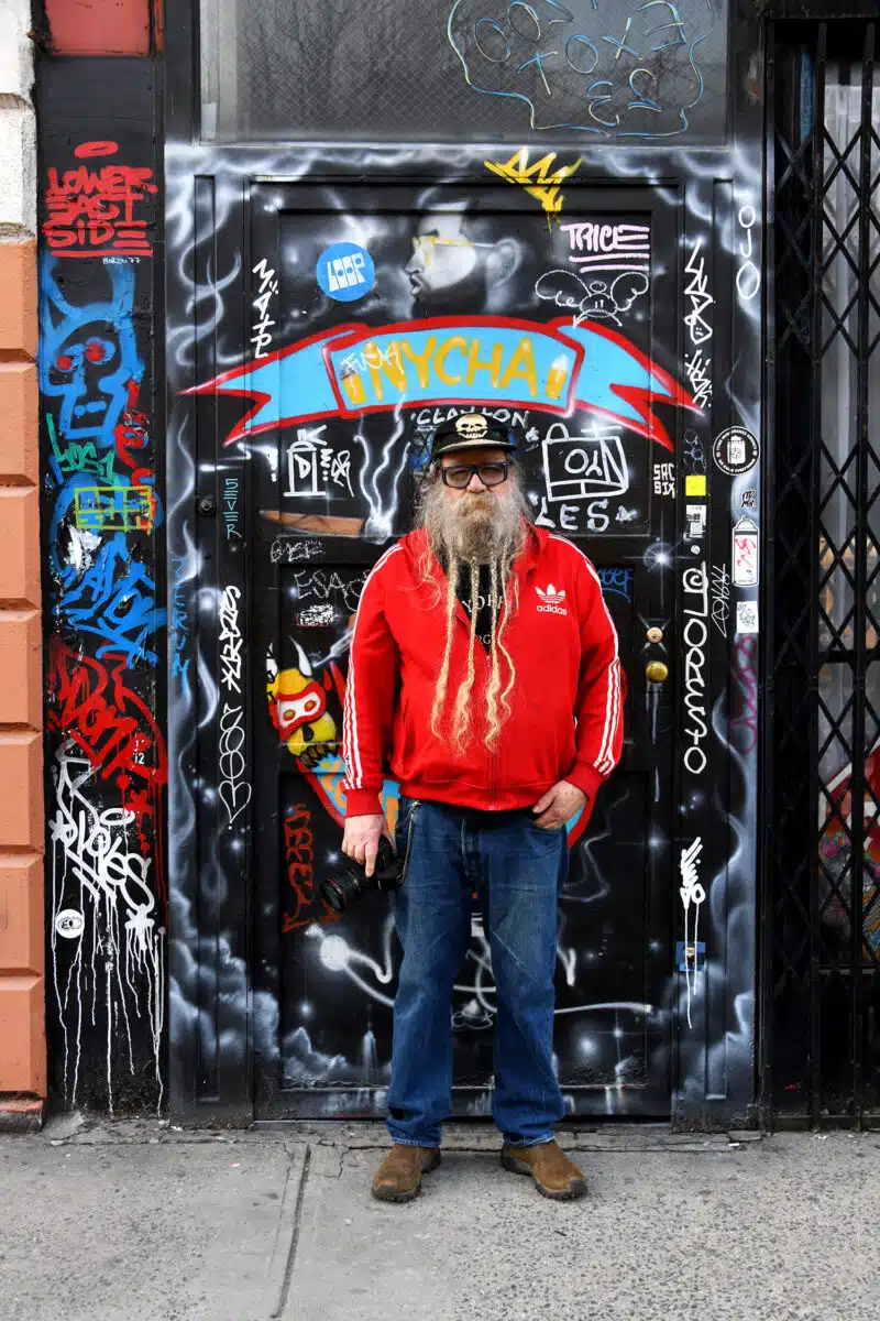 Clayton Patterson at door of his home