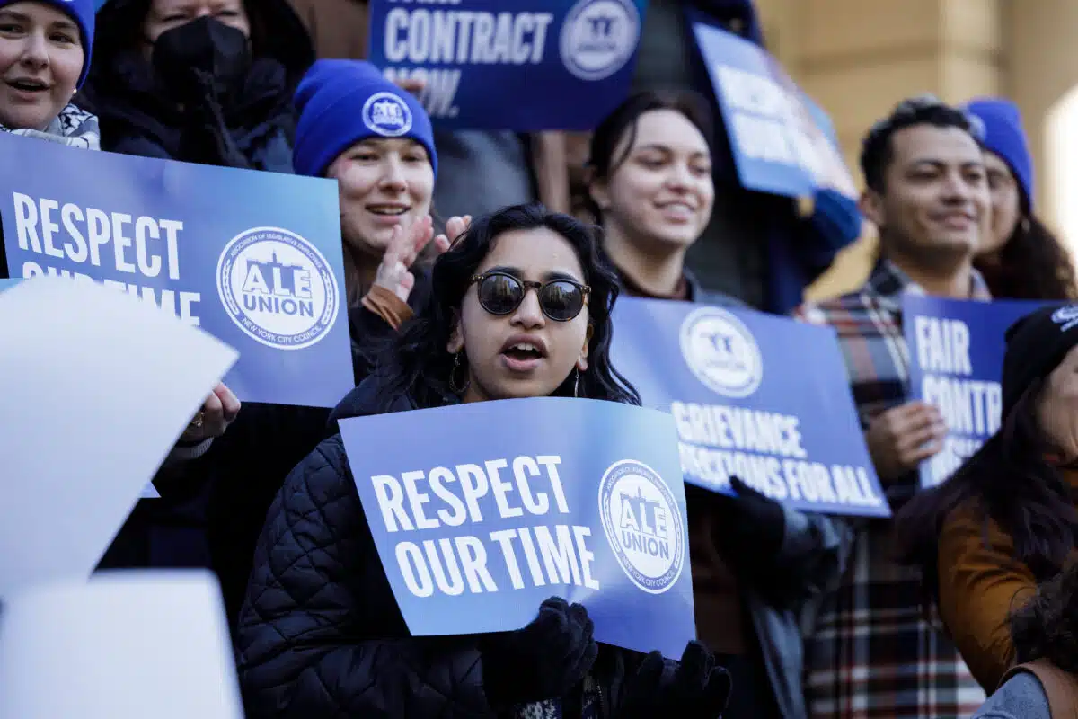 City Council aides rally at City Hall for labor contract