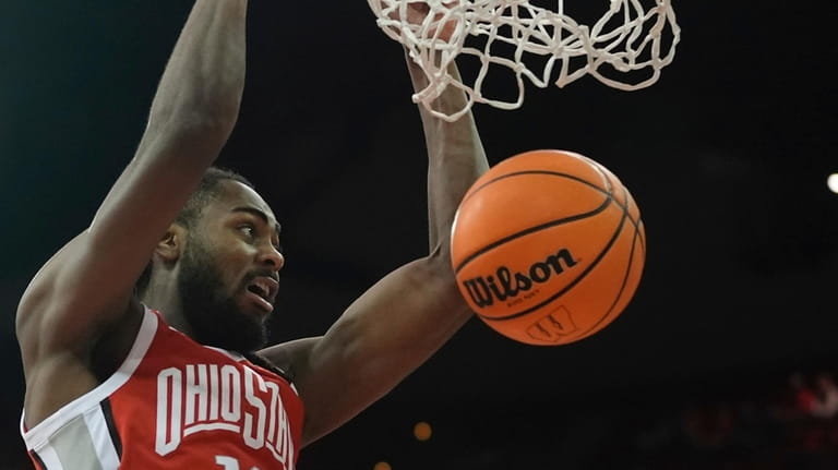 Ohio State's Evan Mahaffey dunks during the first half of...