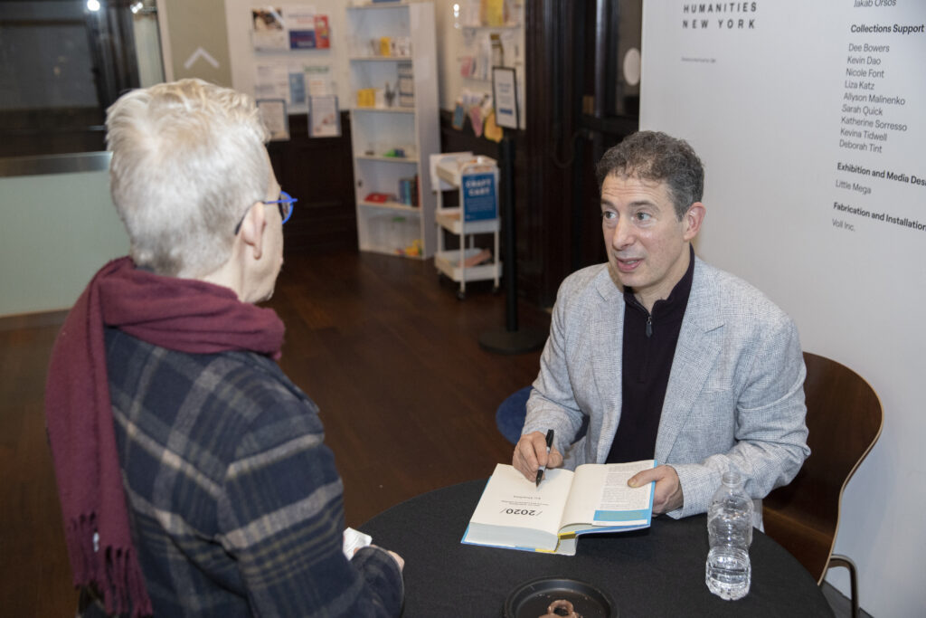 Eric Kilnenberg Signs Barbara Turk’s Copy of 2020 at Klinenberg's book launch.