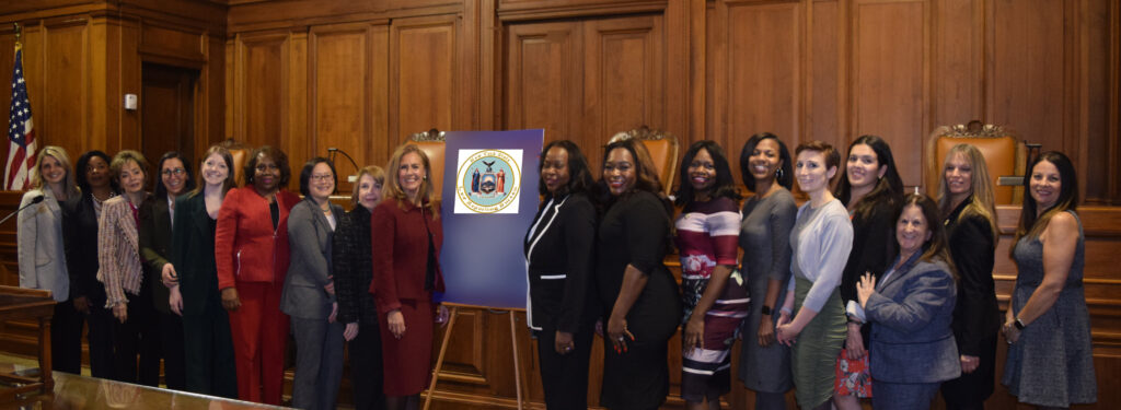 From left to right: Danielle Ciraola, Hon. Dweynie Paul, Helene Blank, Victoria Serigano, Erin Peake, Hon. Cenceria Edwards, Hon. Lillian Wan, Hon. Ellen Spodek, Hon. Connie Mallafre Melendez, Hon. Sylvia Hinds-Radix, Jovia Radix-Seaborough, Hon. Genine Edwards, Karlyne Kequiere, Ashley Iodice, Nancy Ahern, Meryl Schwartz, Marea Wachsman and Susan Mauro.