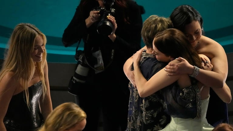 Margot Robbie, far left, looks on as Annette Bening, Lily...