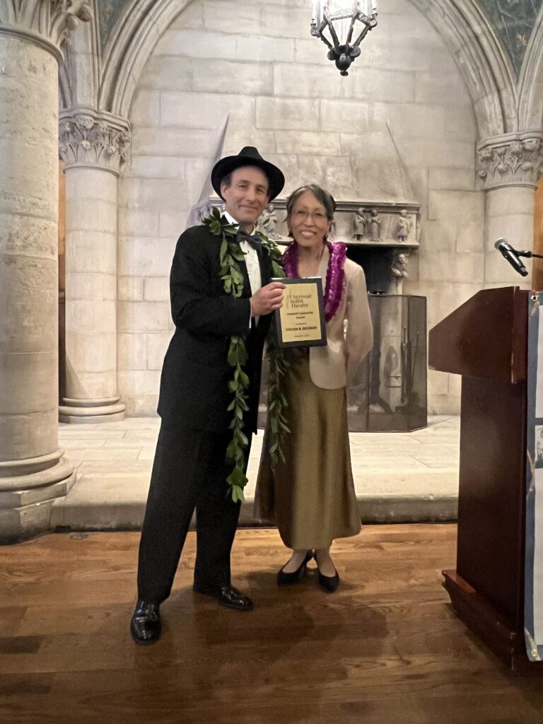 Steven Rissman accepting his award from Marla Hirokawa at CBT Cocktail Caper.