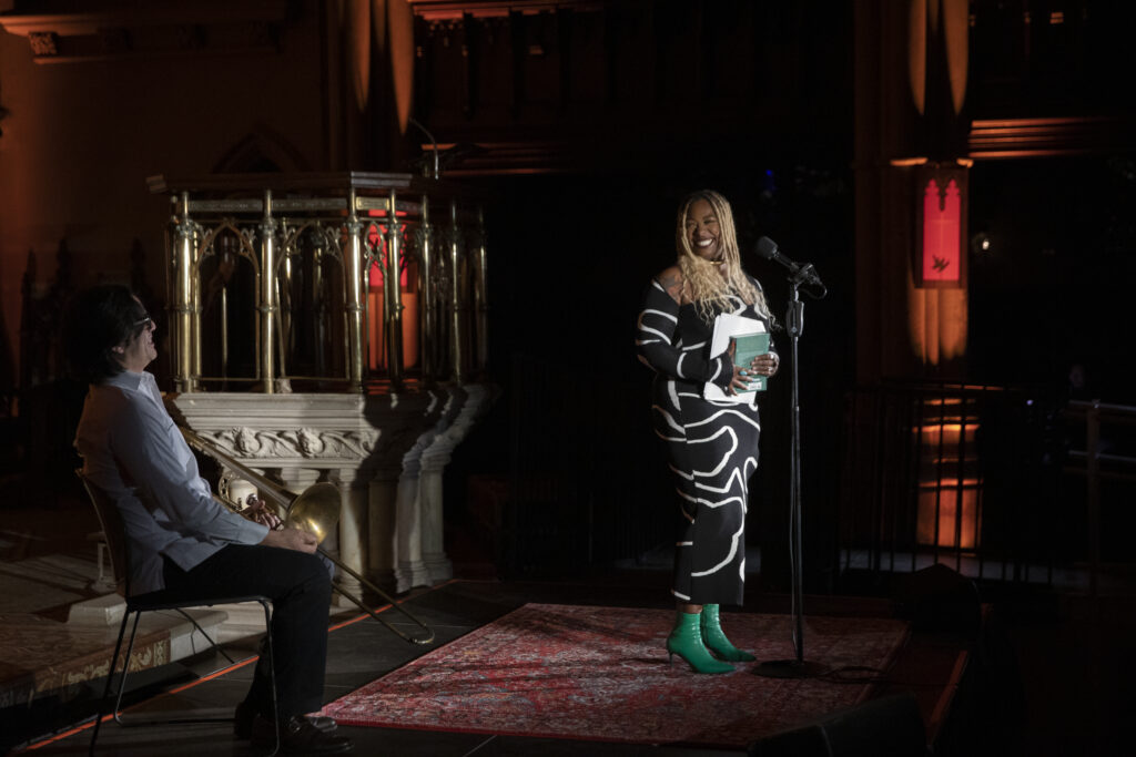 The evening’s host Amber Wallin.Brooklyn Eagle photo by John McCarten