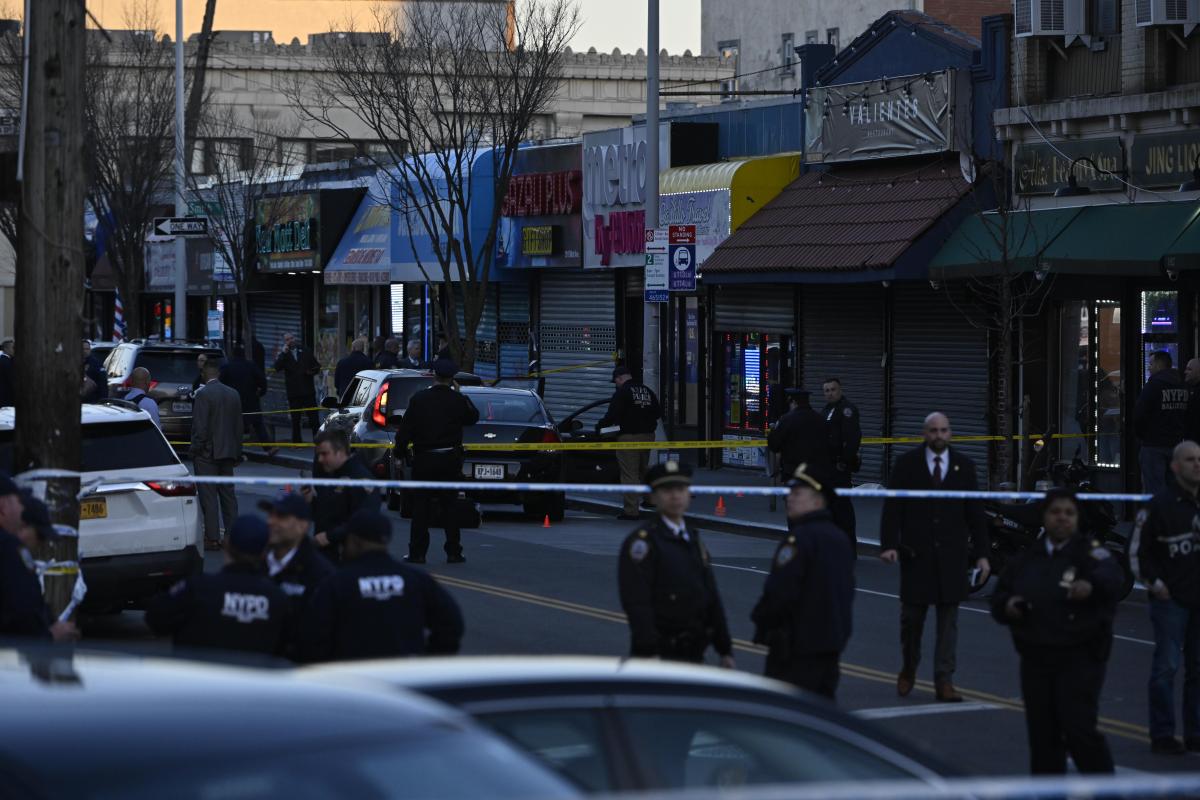 Police in Queens at scene where cop was shot