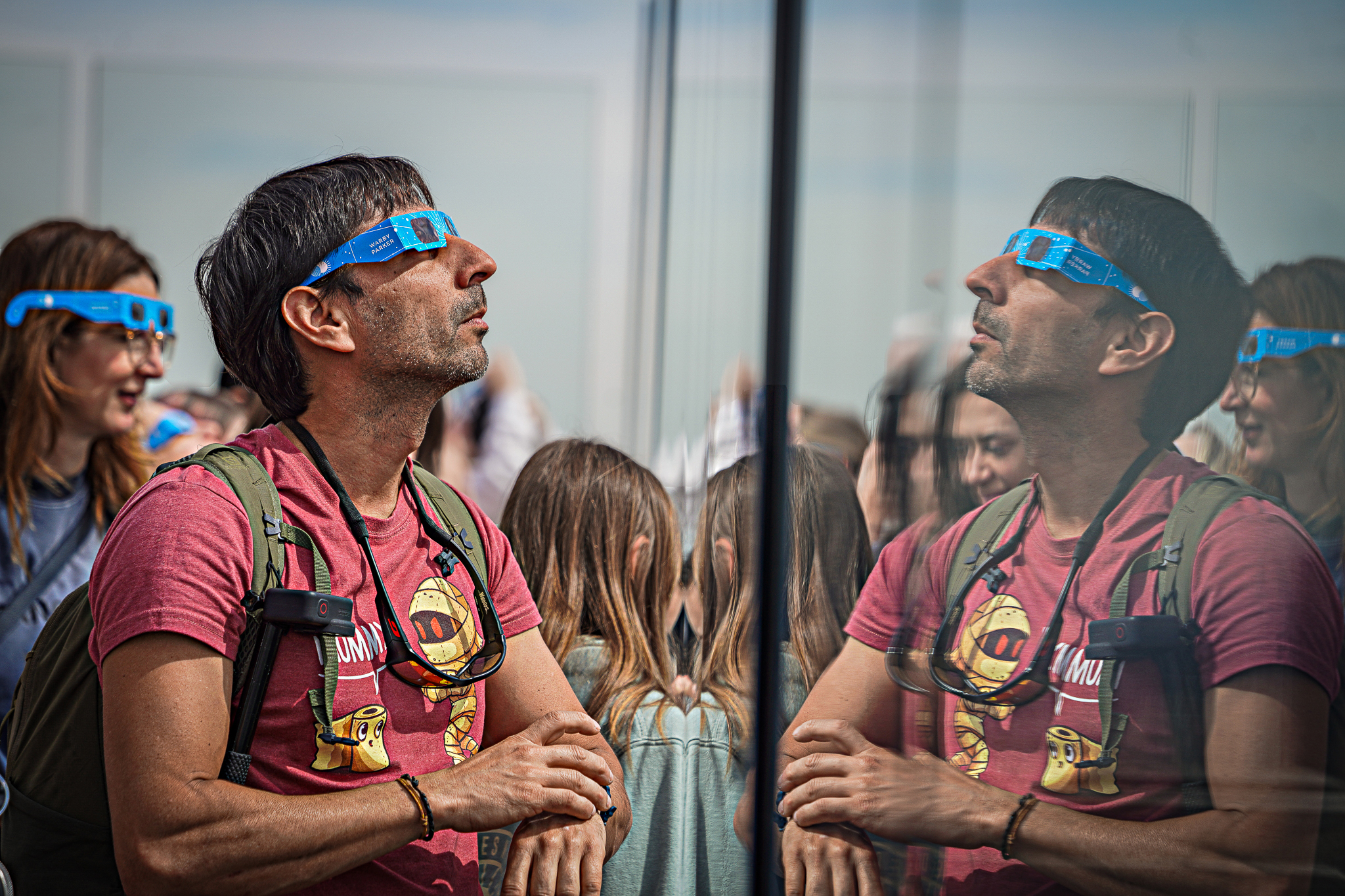 SEE IT! Hundreds view solar eclipse at the Top of the Rock