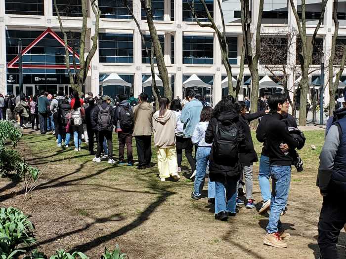 line for eclipse glasses at NYU