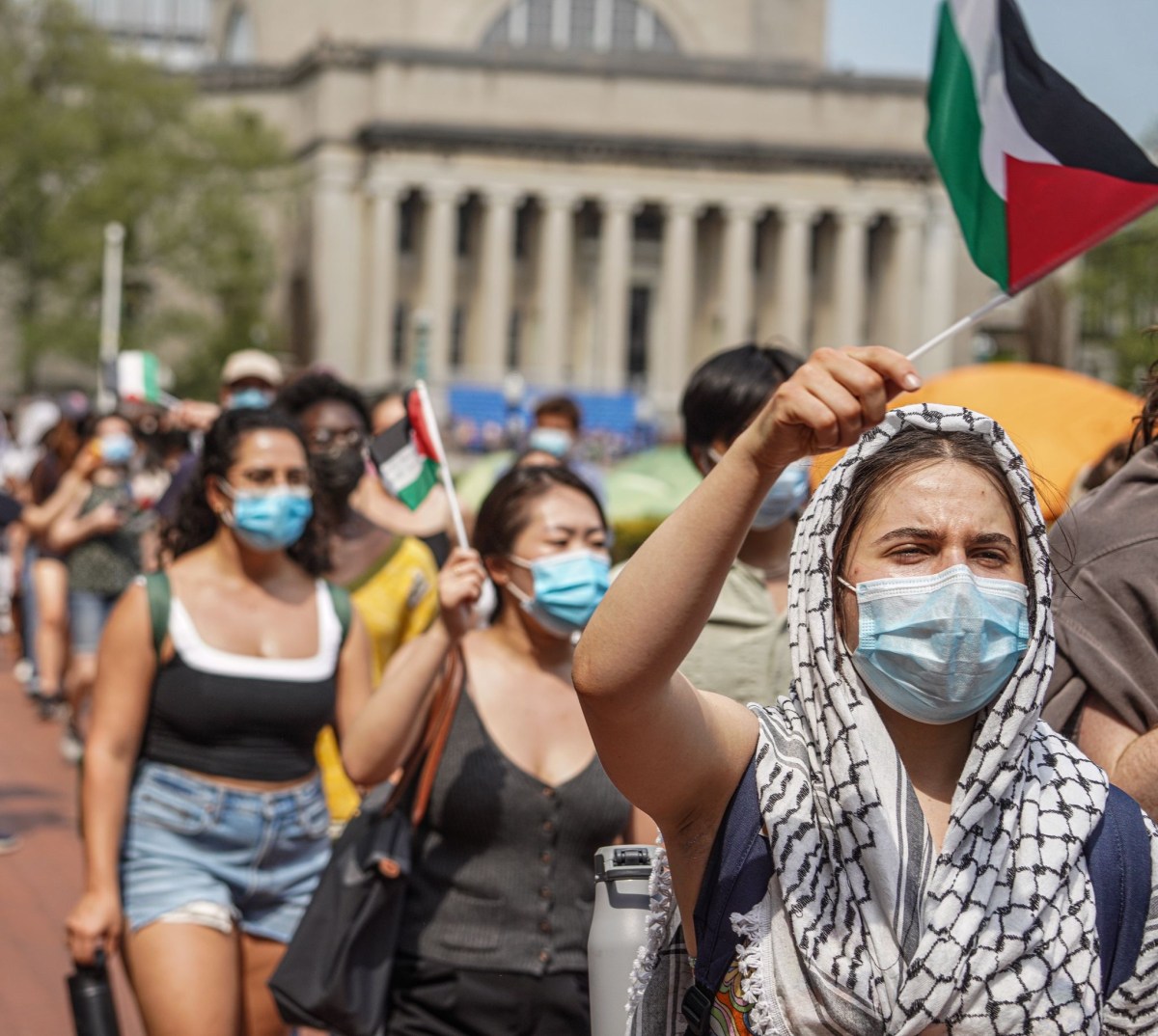 Columbia University protesters on campus in keffiyehs