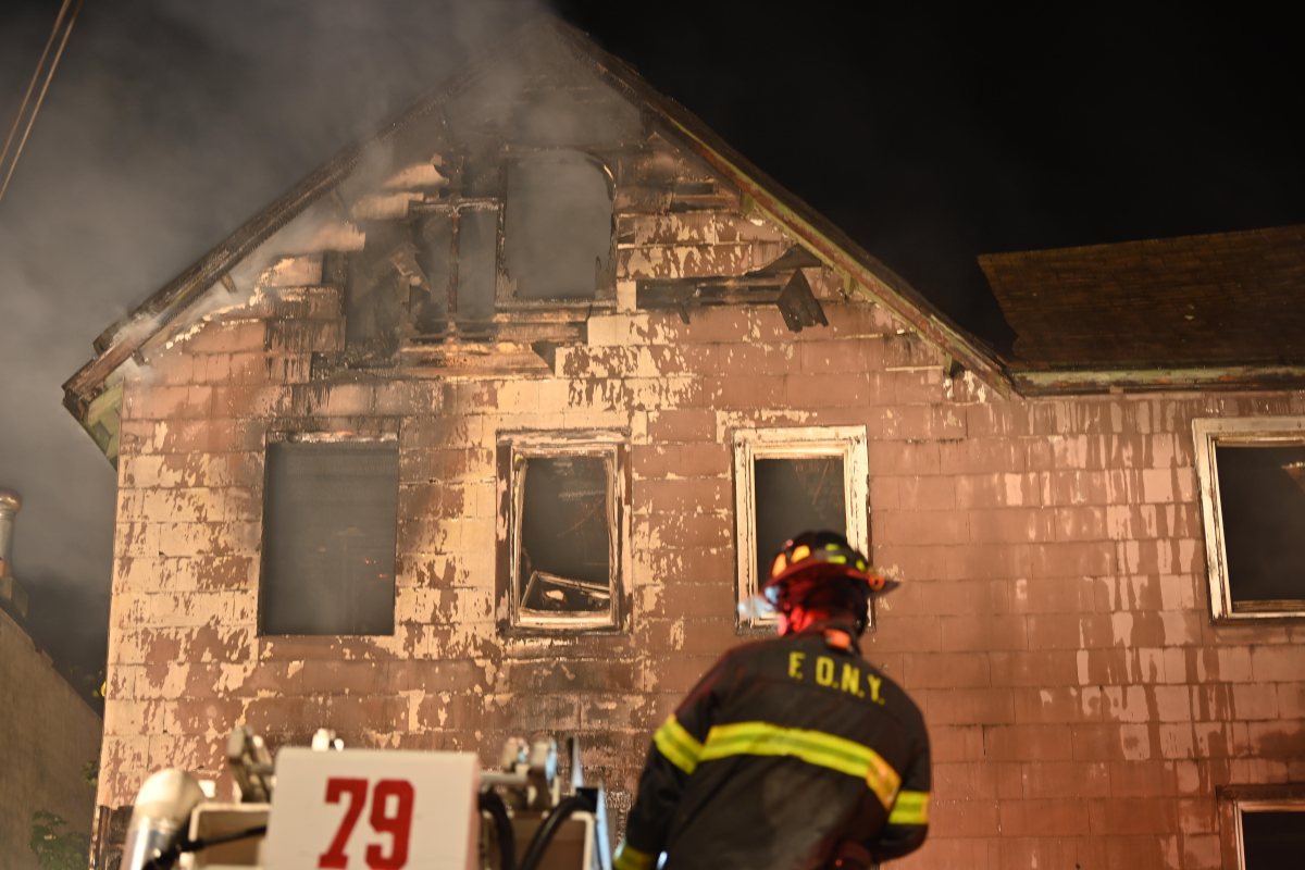 Heavy smoke and fire consumed the top floor of a church during a three alarm fire at  1074 Castleton Avenue.