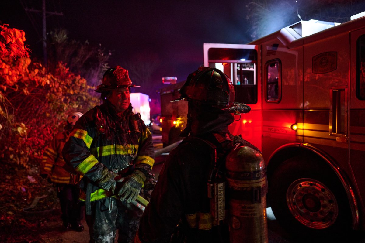 Firefighter in ice and soot after Queens blaze